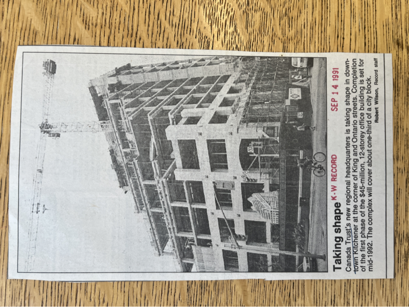 Photo of the building under construction. The skeletal frame of the building is exposed.